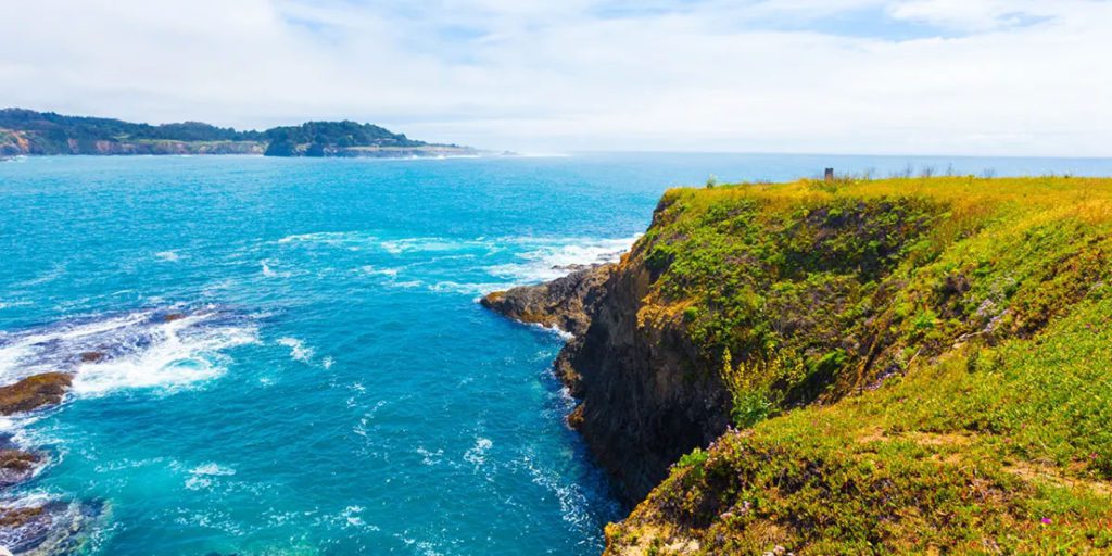 A view of the blue ocean and coast in Medicino, one of the best weekend getaways from San Francisco for families.