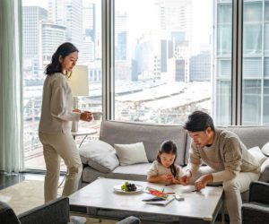 A family spending time together at the Four Seasons Tokyo Hotel.