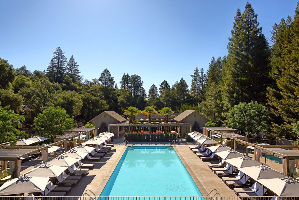 The outdoor pool at Meadowood Napa Valley, one of the best hotels In Napa Valley for a romantic getaway or girls' weekend.