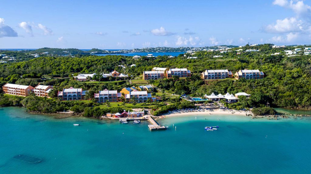 A view of the ocean and beach at Grotto Bay Beach Resort and Spa, one of the best hotels in Bermuda for families.