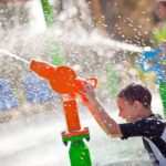 A child playing with a water gun at the Renaissance Orlando at SeaWorld