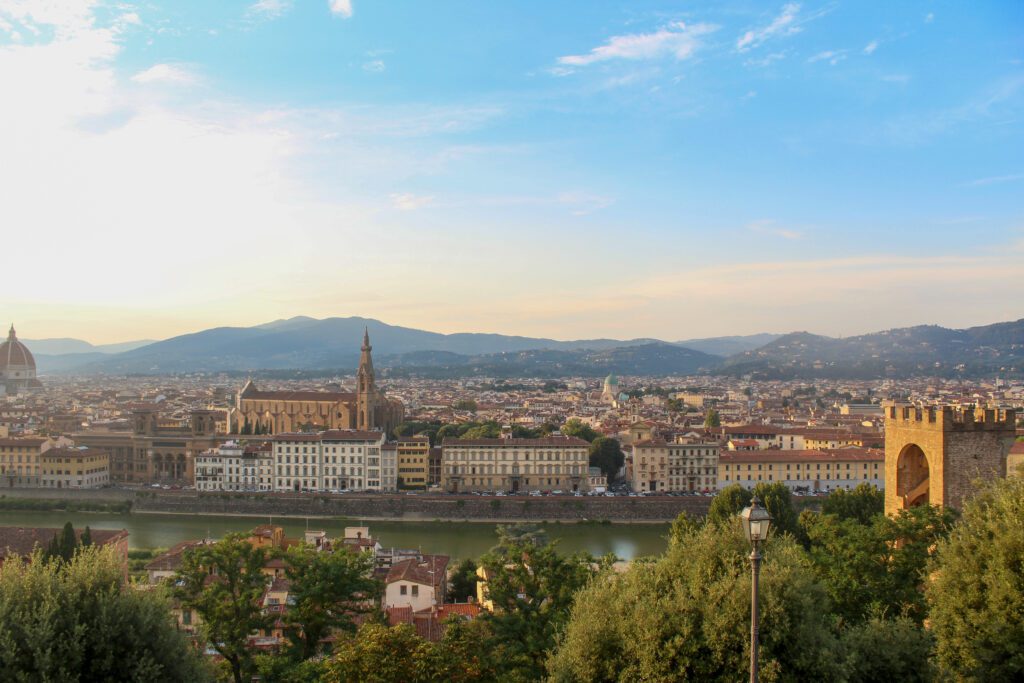 A view over Florence at sunset from Piazzale Michelangelo, one of the best places to visit on a Florence itinerary for families. 