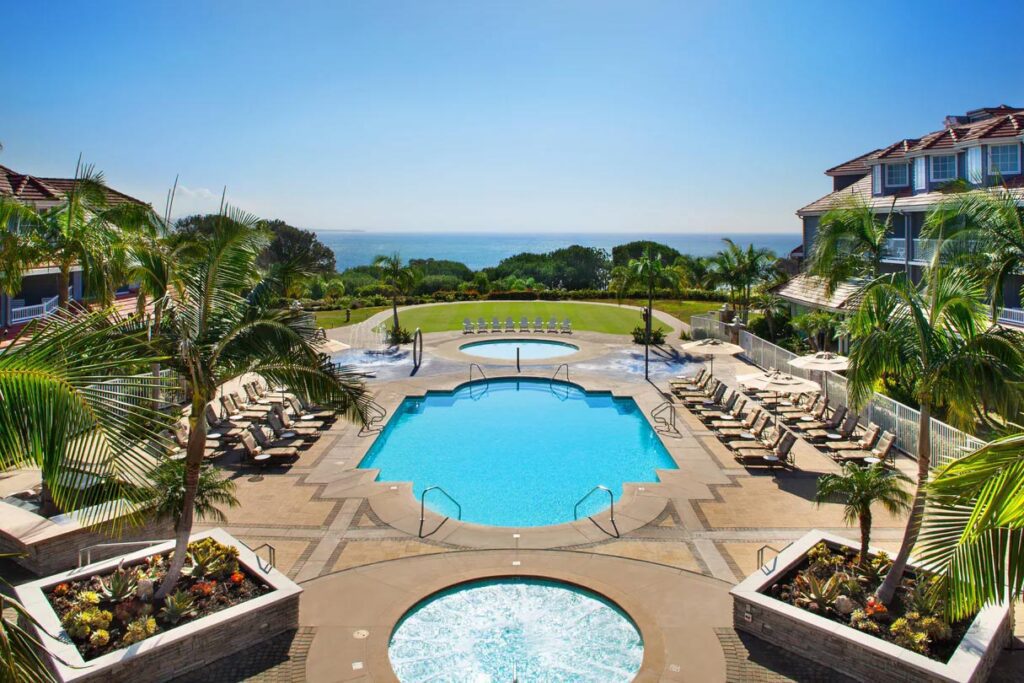 An aerial view of the outdoor pool at the Laguna Cliffs Marriott Resort & Spa, one of the best Marriott hotels in California for families.