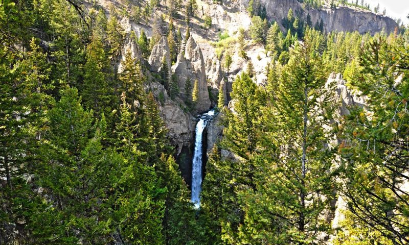 A view of Tower Fall in Yellowstone Park, one of the best places to visit on a Yellowstone National Park itinerary for families. 
