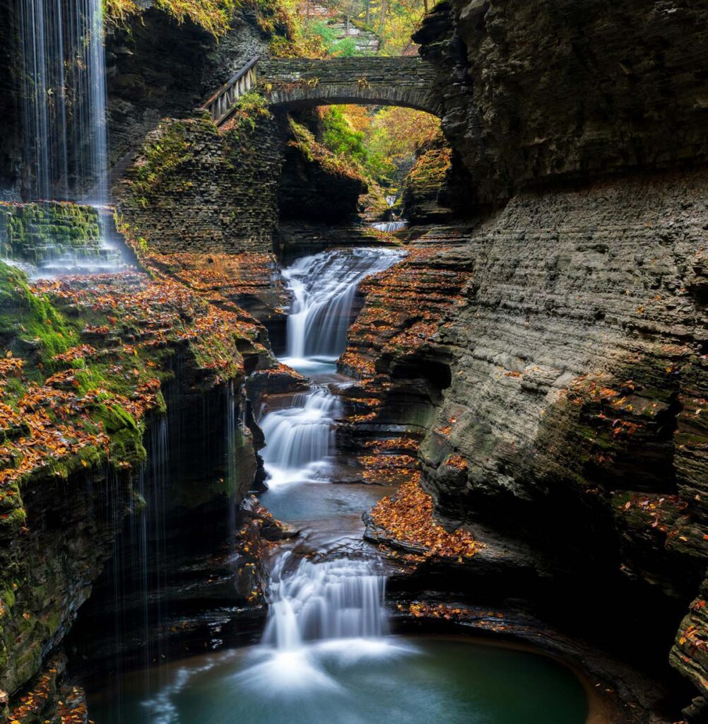 A view of the waterfall in Watkins Glen State Park, one of the best places to stop on an NYC to Niagara Falls itinerary for families. 