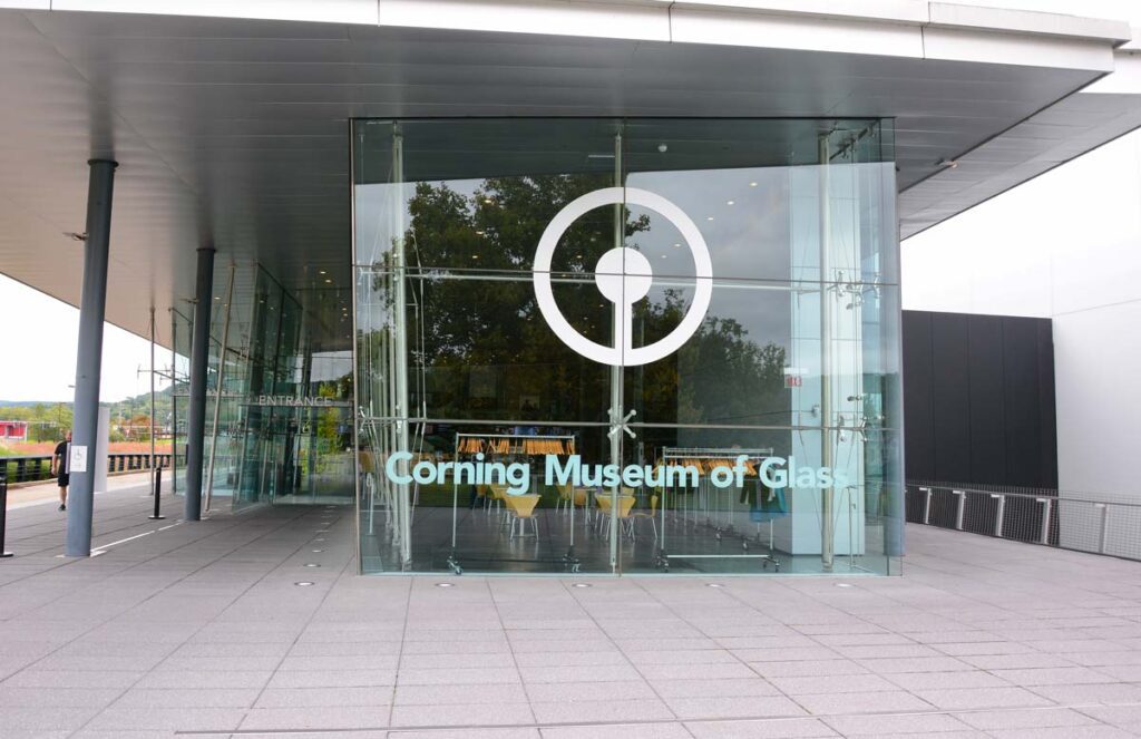 The exterior of the Corning Museum of Glass, one of the best places to stop on an NYC to Niagara Falls itinerary for families. 