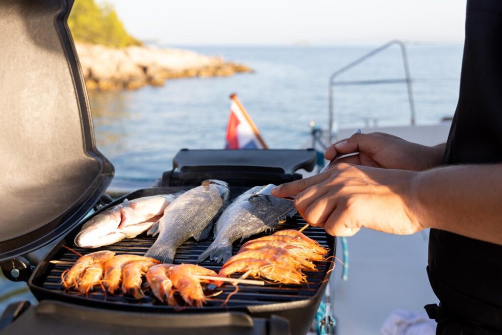 Fresh seafood barbecue on a Mediterranean catamaran