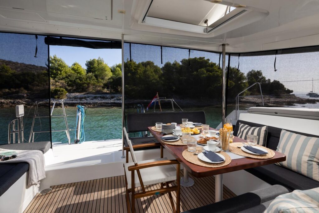 Breakfast setup on a catamaran charter in the Mediterranean