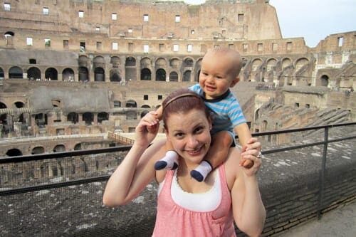 Rome Vacation Kids, Mother holding baby son on shoulders in Rome vacation with kids Italy